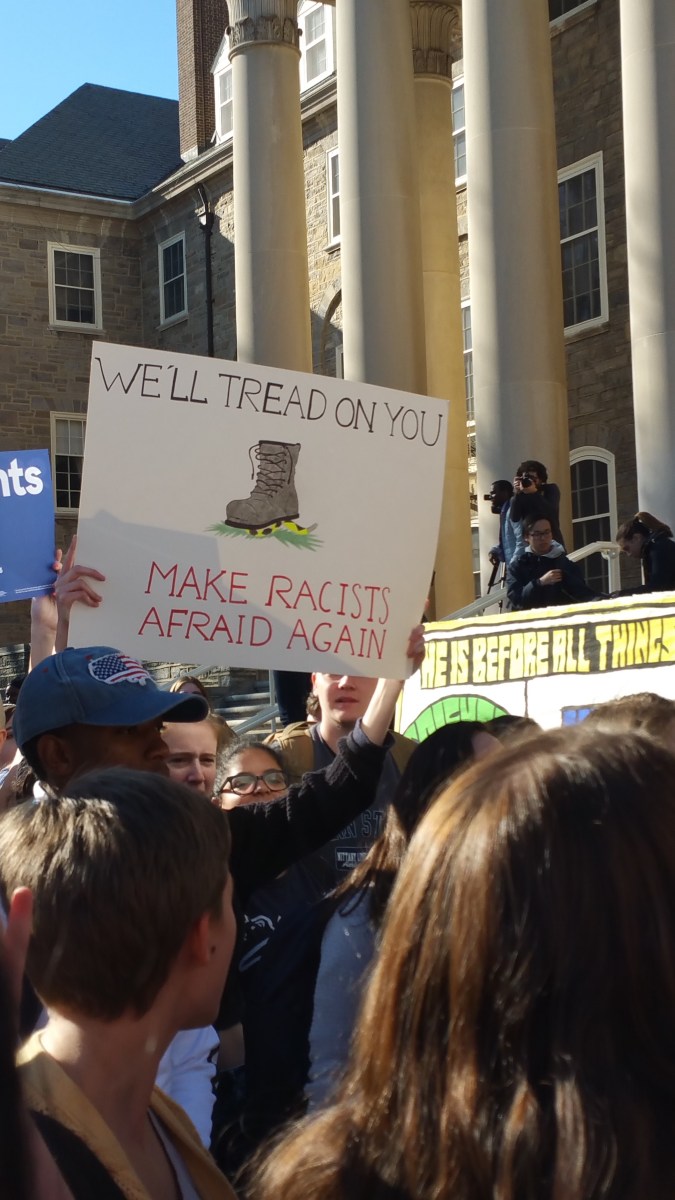 picture of a boot underneath the words "We'll Tread on You" followed by "Make Racists Afraid Again."