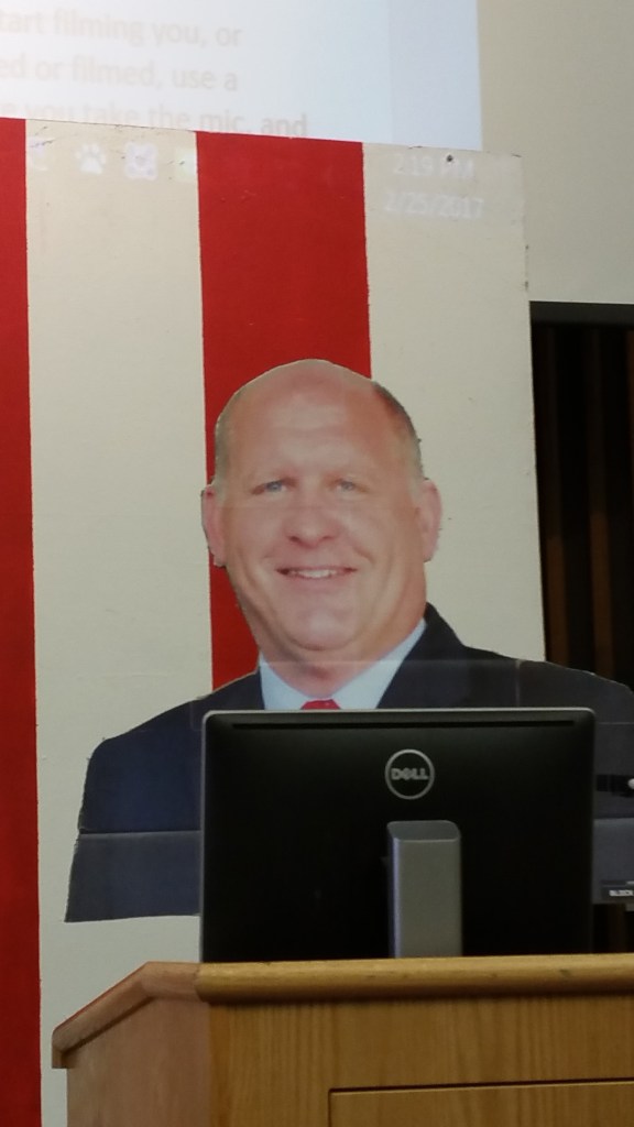 heal and shoulder ardboard cutout of Representative GT Thompson